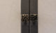 bespoke black, glossy, mosaic doorknob accessory design from london riverside apartment project