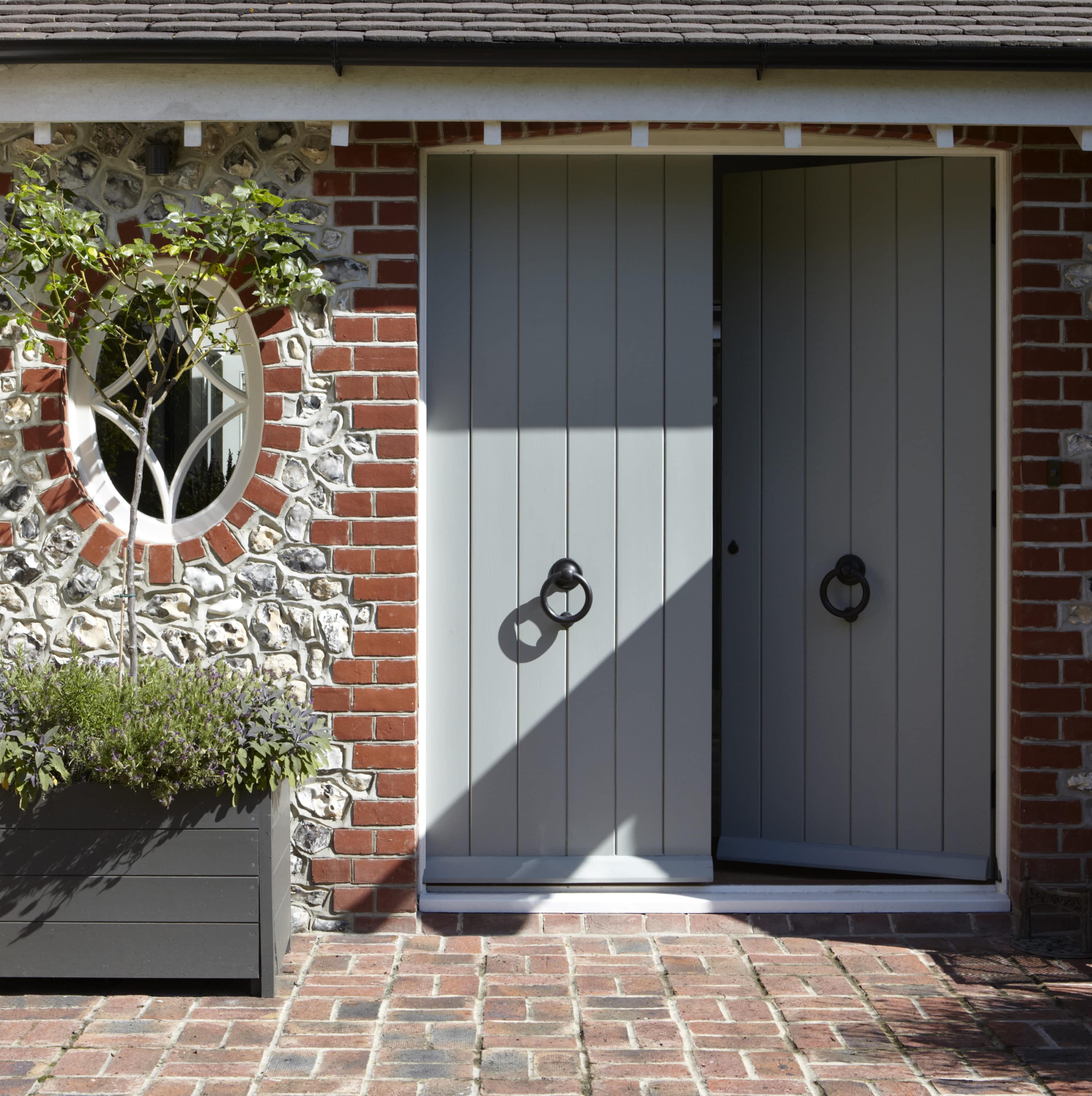 country house in sussex soft pastel front door design 