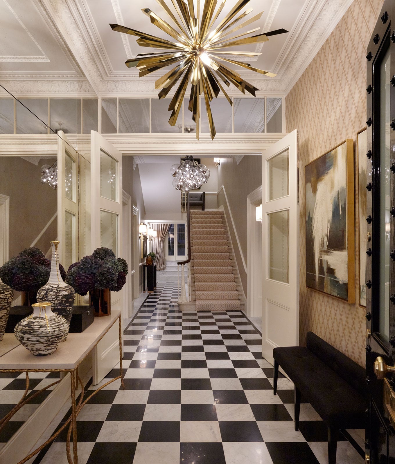 Entrance hall with dramatic sculptural chandelier