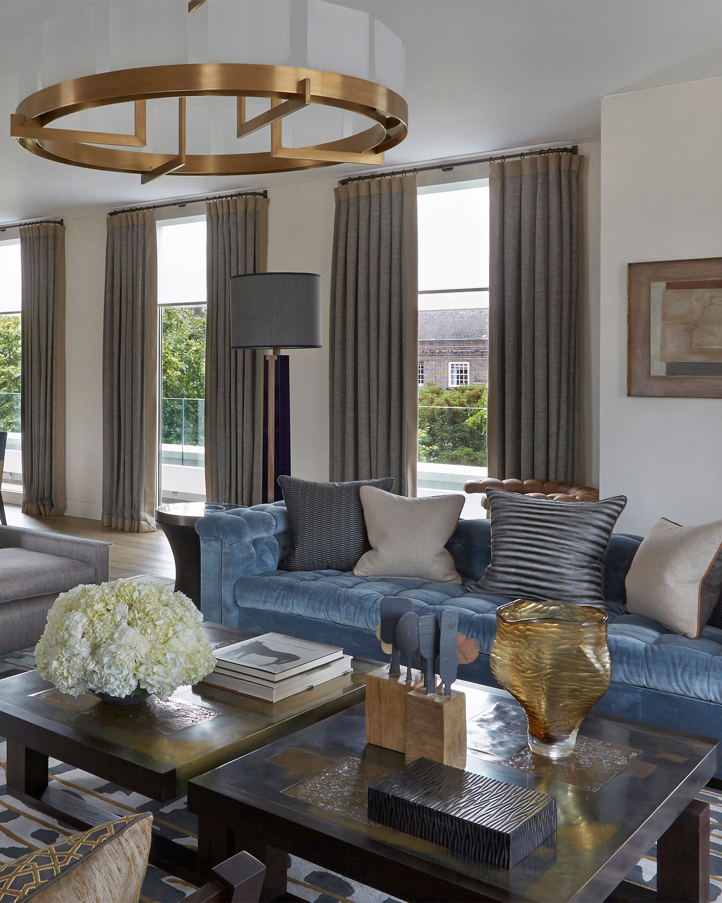 Bespoke, luxury formal living room in blue and brown tones