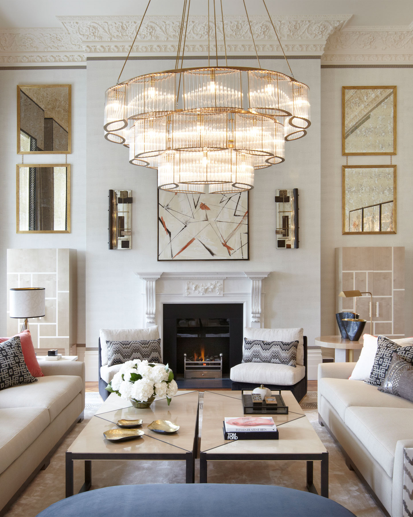 Formal living room with bespoke glass and brass chandelier